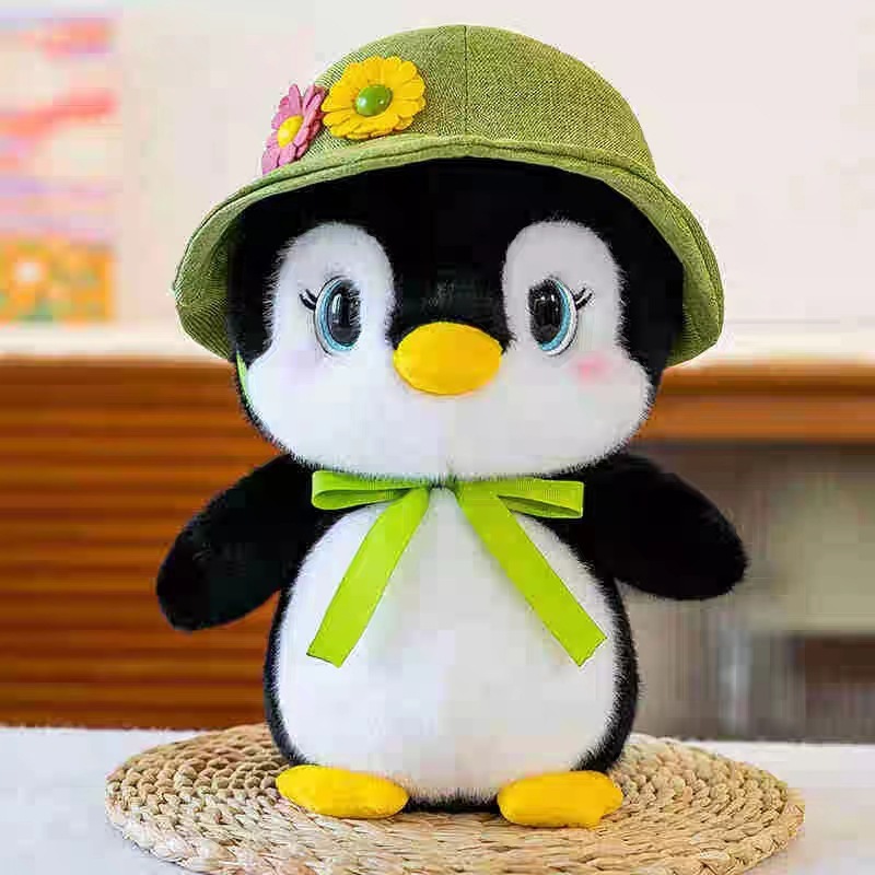 Bonito sombrero pingüino juguete de peluche 11CM animales pequeños pingüinos niños regalo de cumpleaños muñeca agarra