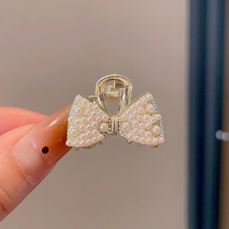 Nuevo medio lazo pelo pequeño clip simple tiburón clip accesorios para el cabello para las mujeres Pequeño clip de metal tamaño pequeño perla horquilla rota 2024