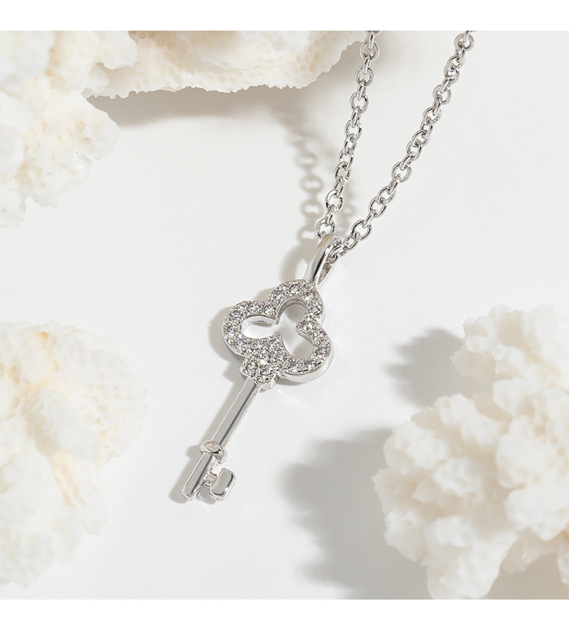 Colored gold clover zircon hollow short collarbone chain irregular INS minimalist artistic style lucky key necklace_voghion.com