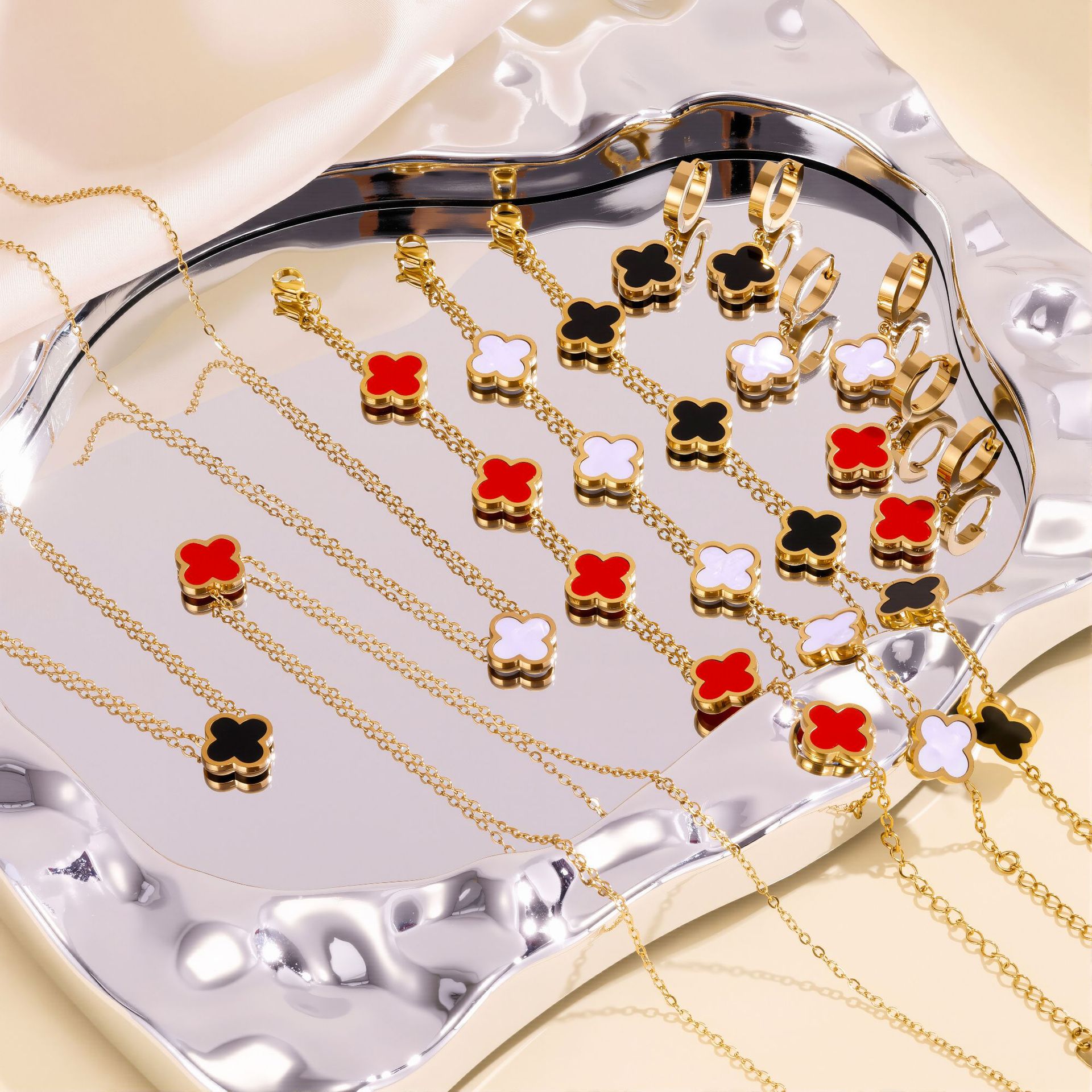 Glossy Four-Leaf Clover Set Titanium Steel Real Gold Electroplated Waterproof Non-Fading Glossy Bracelet Necklace Earrings Factory Direct Sale