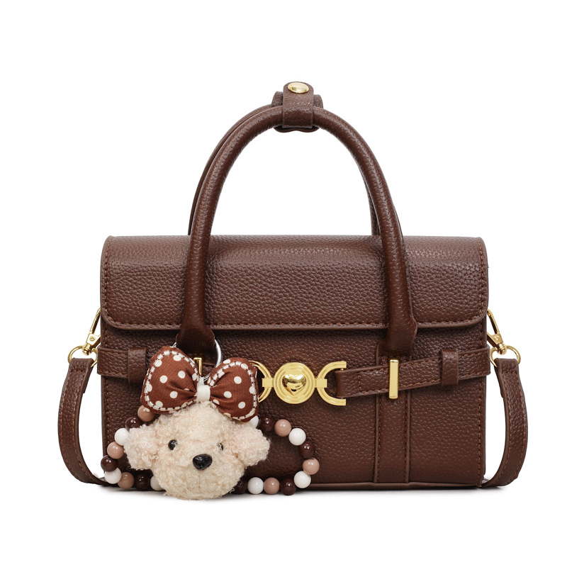 Alta textura de hardware decoración bolso de mano mujer 2026 nuevo popular litchi pattern casual versátil mochila