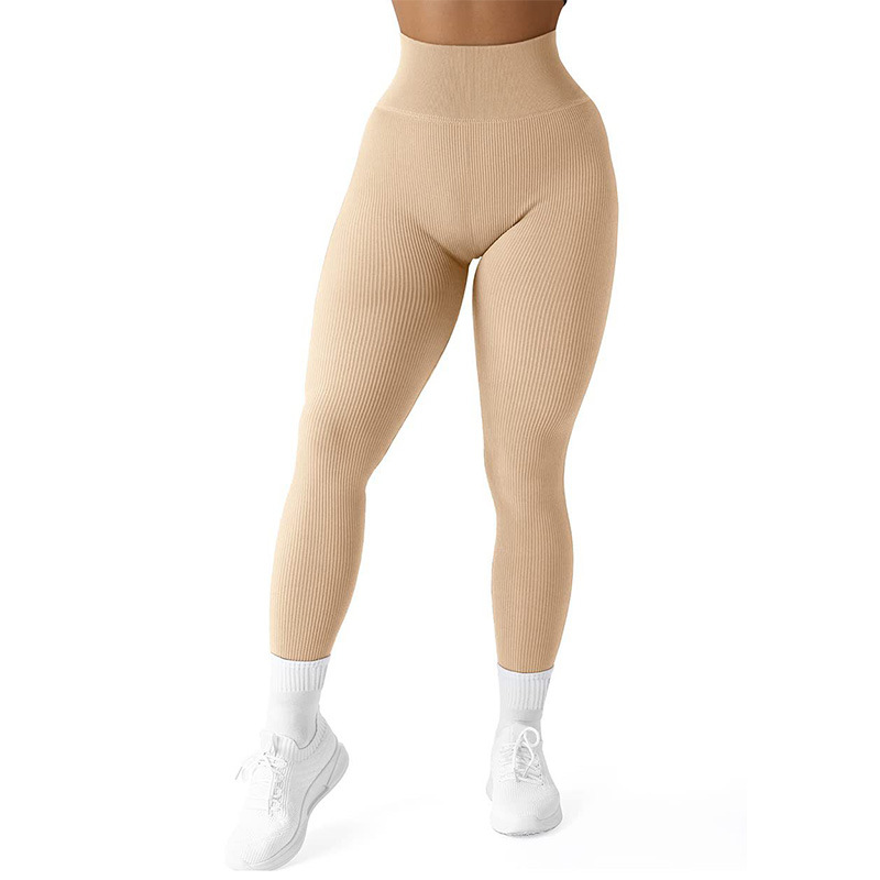 Pantalones de yoga sin costuras de color sólido estilo explosivo, ropa de yoga al aire libre para correr tridimensional ajustada, pantalones casuales de abdomen y levantamiento de cadera, mujeres