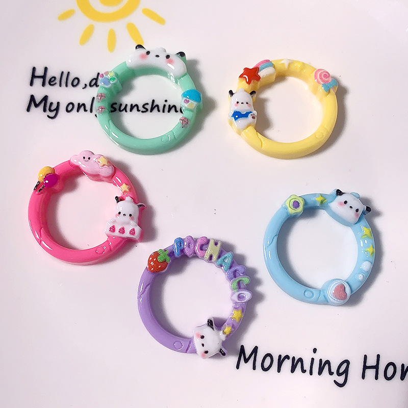 Nuevos dibujos animados Sanrio Pacha imitación anillo abierto DIY accesorios de resina adornamiento para el cabello crema caja de teléfono móvil llavero