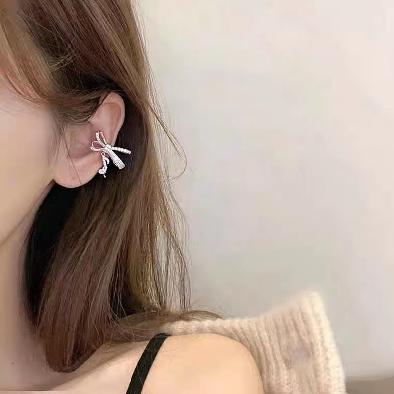 S925 Corea del Sur Luz de lujo completo diamante bowknot nota nicho diseño sentido earless oreja pendientes clip [un paquete]