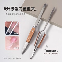 ネイルアートの形は木の柄のステンレスの形を挟みます。