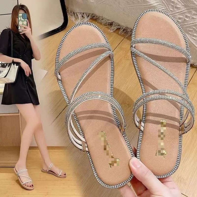 Sandallas de diamante de verano para mujeres 2026 nuevo estilo coreano versátil con suela suave antideslizante tacones bajos para salir dos zapatillas de moda para mujeres