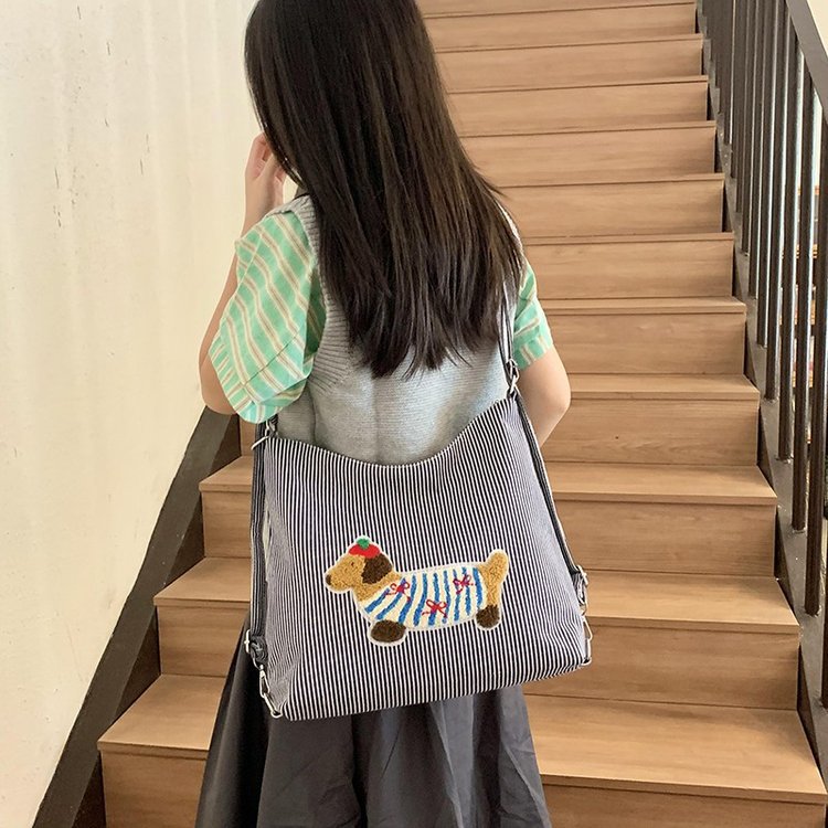 Ülipopulaarne niši ruuduline värvipliiatsiga koer naistele 2024. aasta uus mitmekülgne õlakott kaenlaaluste jaoks, ämbrikott_voghion.com