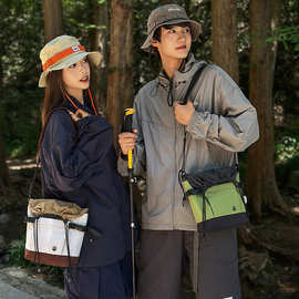 2026四季通款情侣款拼接撞色户外旅行拼接撞色抽绳大容量单肩包