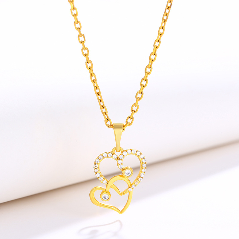 Joyería Xuping moda japonesa y coreana colgante en forma de corazón nicho de diseño de joyería al por mayor collar de amor femenino colgante