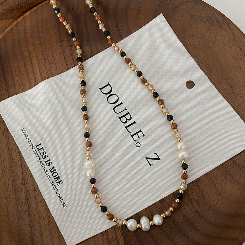 Collar con cuentas de ojo de tigre Maillard Cadena de suéter de otoño e invierno de alta calidad Acero de titanio Cadena de clavícula de piedra natural retro de lujo ligero