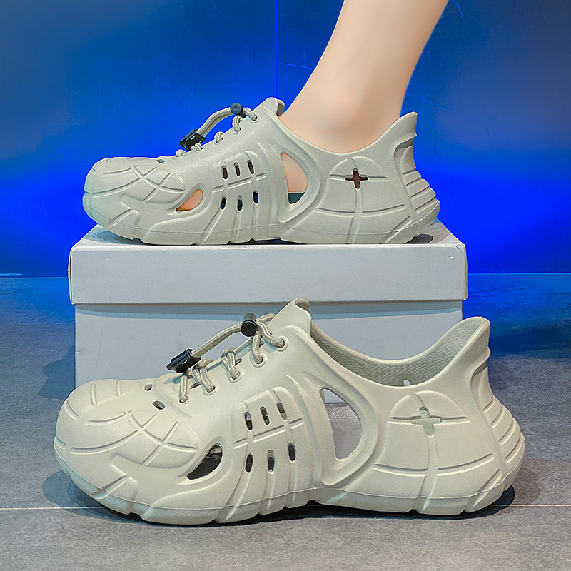 En nombre de los nuevos zapatos de vadeo deportivos de moda, zapatos con agujeros antideslizantes al aire libre de verano, sandalias Baotou ligeras de suela suave para hombres