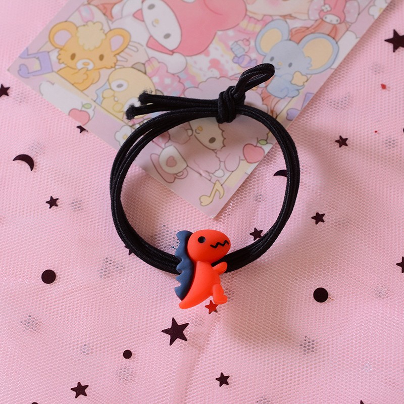 Red little dinosaur hair rope
