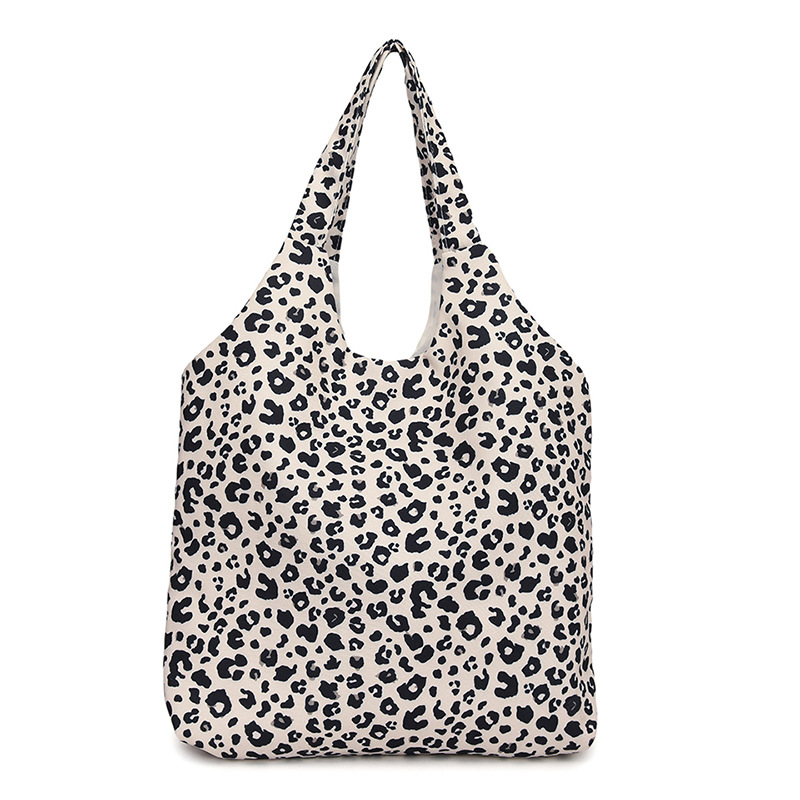 La sensación de relajación de la personalidad de la bolsa de leopardo de gran capacidad de mujer nueva bolsa de algodón simple de hombro universal bolsa de viaje de clase