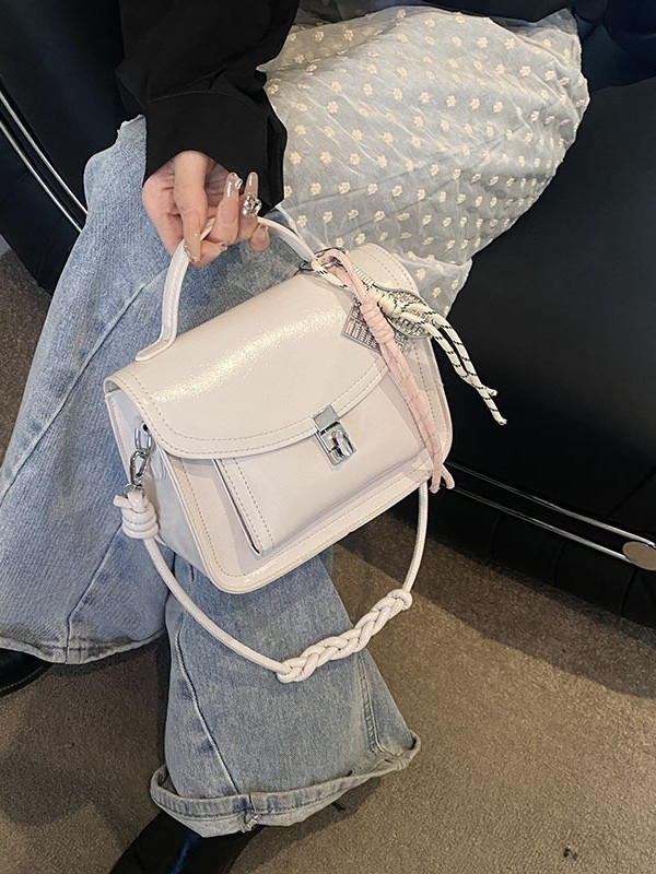 Bolso de mano retro coreano para mujeres 2025, nuevo bolso de cartero universal, simple bolso de mujer de viaje casual.