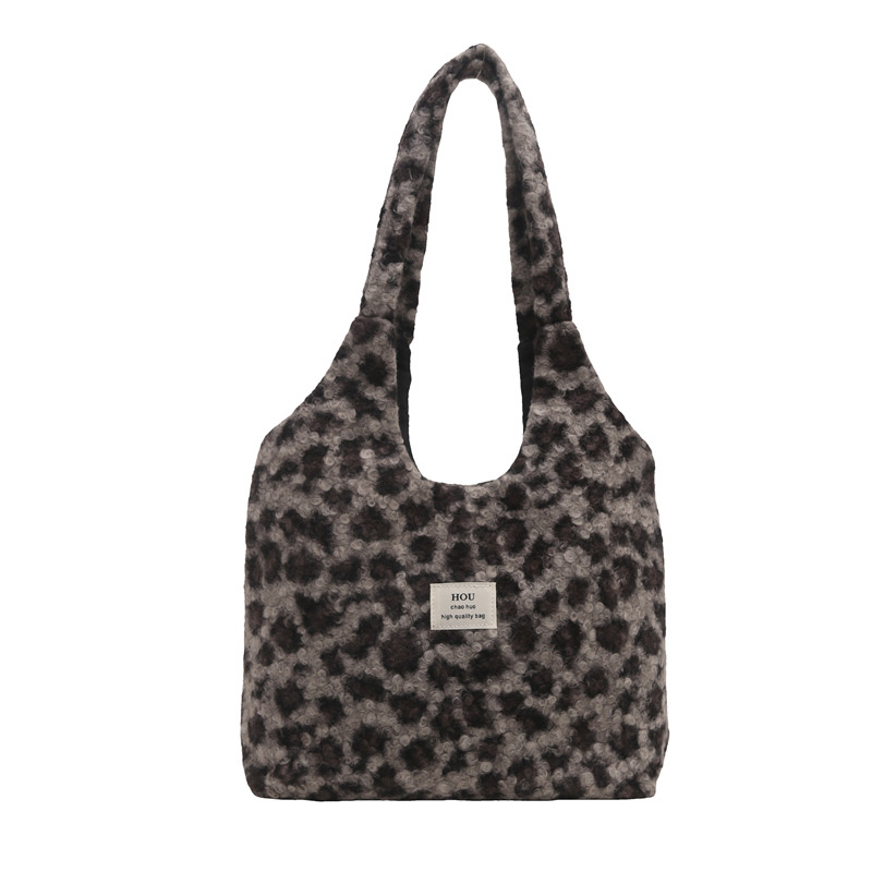 Moda de invierno perezoso nuevo bolso de peluche estampado leopardo 2024, otoño y invierno nuevo temperamento bolso de hombro bajo la axila de mujer