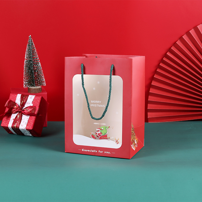 Bolsa de regalo de Navidad ventana transparente bolsa de papel portátil copo de nieve bolsa de papel Kraft exquisito embalaje bolsa de regalo en stock