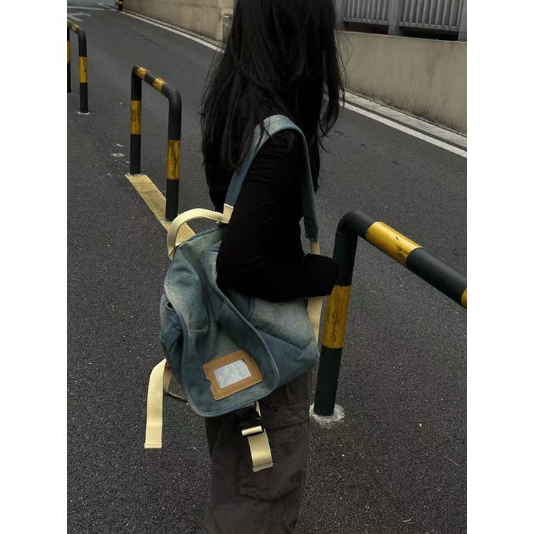 Homemade new fashionable washed contrasting denim carrying backpack, simple and casual commuting large capacity backpack_voghion.com