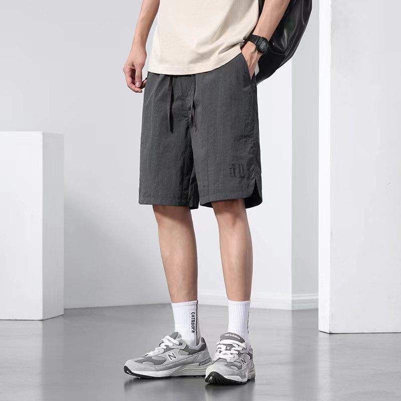 Camisas menos ropa nuevo verano suelto seda de hielo seda de hielo velocidad herramientas pantalones cortos delgados pantalones rectos casuales de cinco puntos