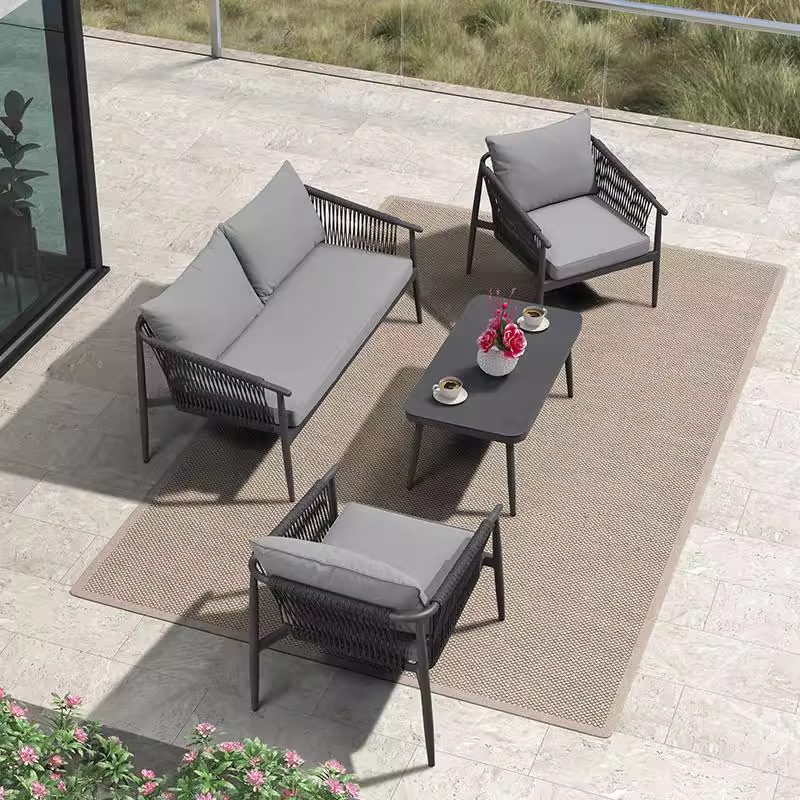 Nórdico al aire libre sofá trenzado de cuerda patio impermeable solar villa mesa de té combinación de muebles de ocio al aire libre