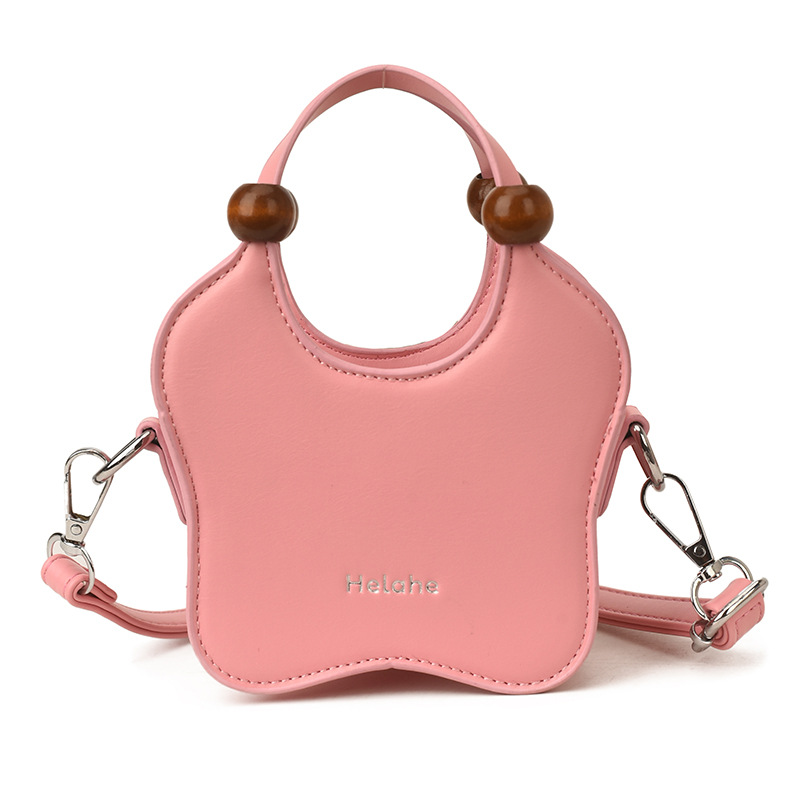 Bonita pequeña estrella en forma de bolso de hombro para niños y niñas, exquisita mini bolso de bebé, bolso para niños de comercio exterior transfronterizo