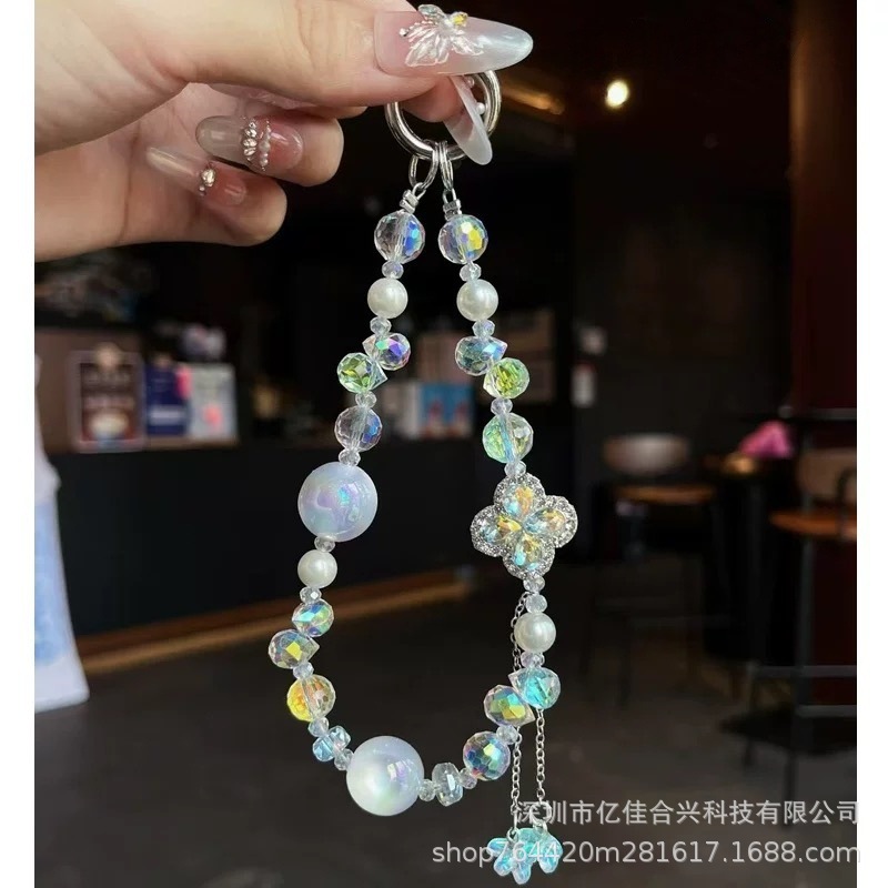 Advanced sense borla trébol de cuatro hojas cristal moda colgante de caja para teléfono móvil cordón cielo estrellado colorido cadena de muñeca de cuentas Heidi