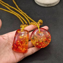 仿花珀水滴吊坠蜜蜡无事牌毛衣链仿血蜜彩色男女直播项链会销礼物