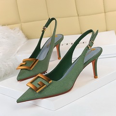 8999-5 European and American-style banquet women's shoes: stiletto heels, low-cut design, pointed toe, hollowed-out back strap with metallic square buckle.