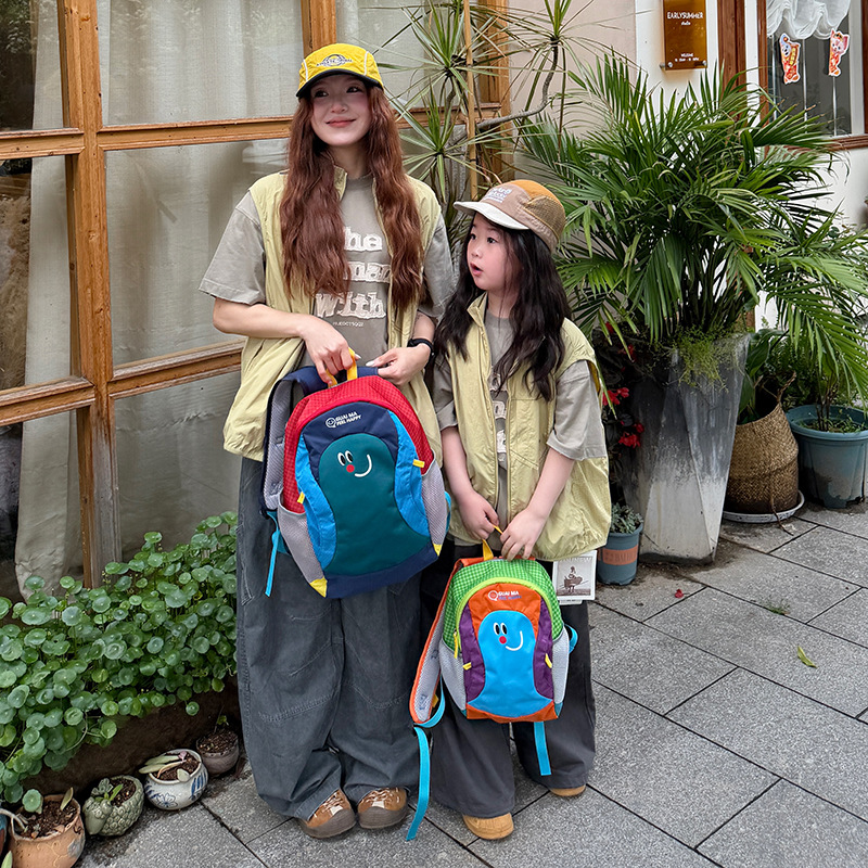 Hermosa cara sonriente para padres e hijos viajar mochila de gran capacidad de contraste de color bolsas escolares de dibujos animados lindas mochila infantil