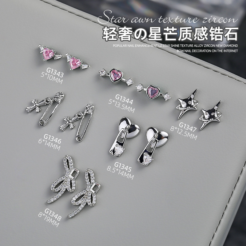 Populares en línea celebridad manicura LZ estrella cerradura corazón textura aleación ZIRCON nuevo diamante arco decoración de uñas al por mayor