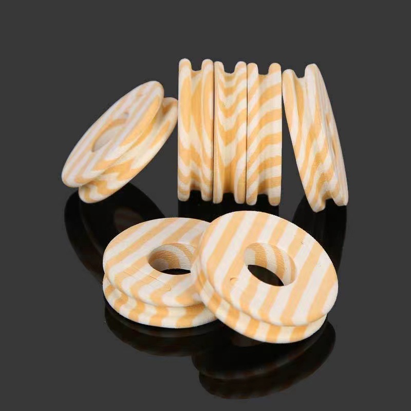 Fábrica de producción al por mayor anillo de espuma de color bobina de grano de madera eje principal bobina de bobinado de grano de madera