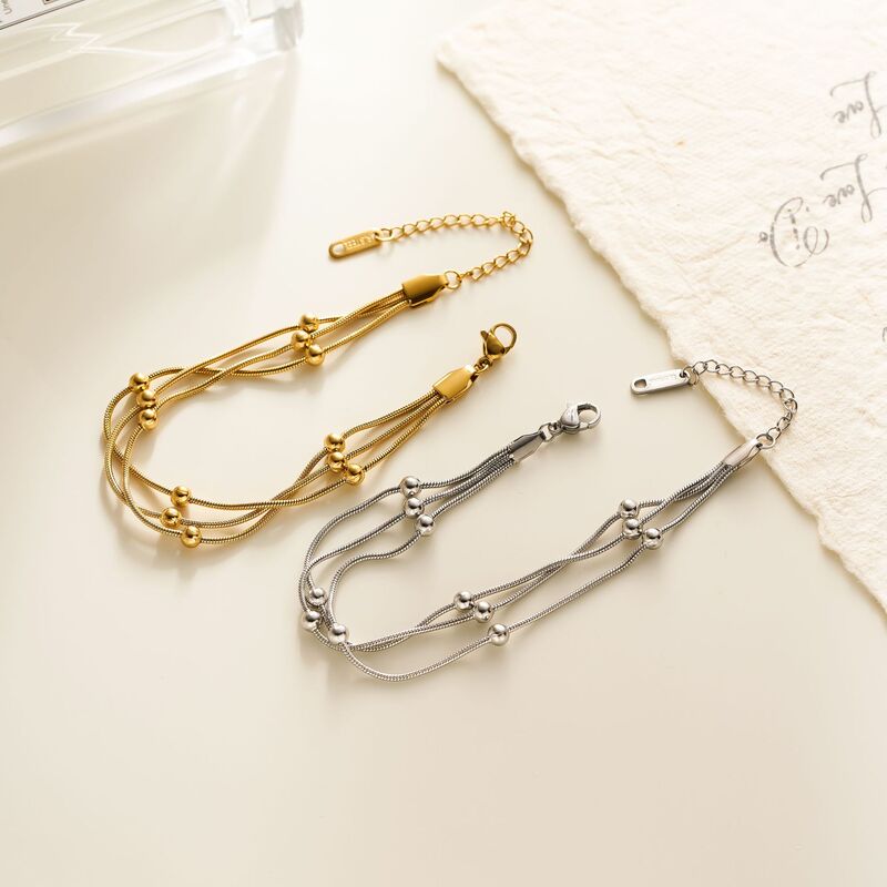 Cross-border Hot Selling 18k Gold Stainless Steel Three-layer Snake Bone Chain Bead Bracelet Fashion Simple Personalized Niche Bracelet Cross-border Hot Selling 18k Gold Stainless Steel Three-layer Snake Bone Chain Bead Bracelet Fashion Simple Personalized Niche Bracelet