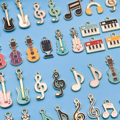 40個のドリップオイル音楽ギターバイオリンピアノ音符合金ペンダントdiyキーホルダーアクセサリー部品