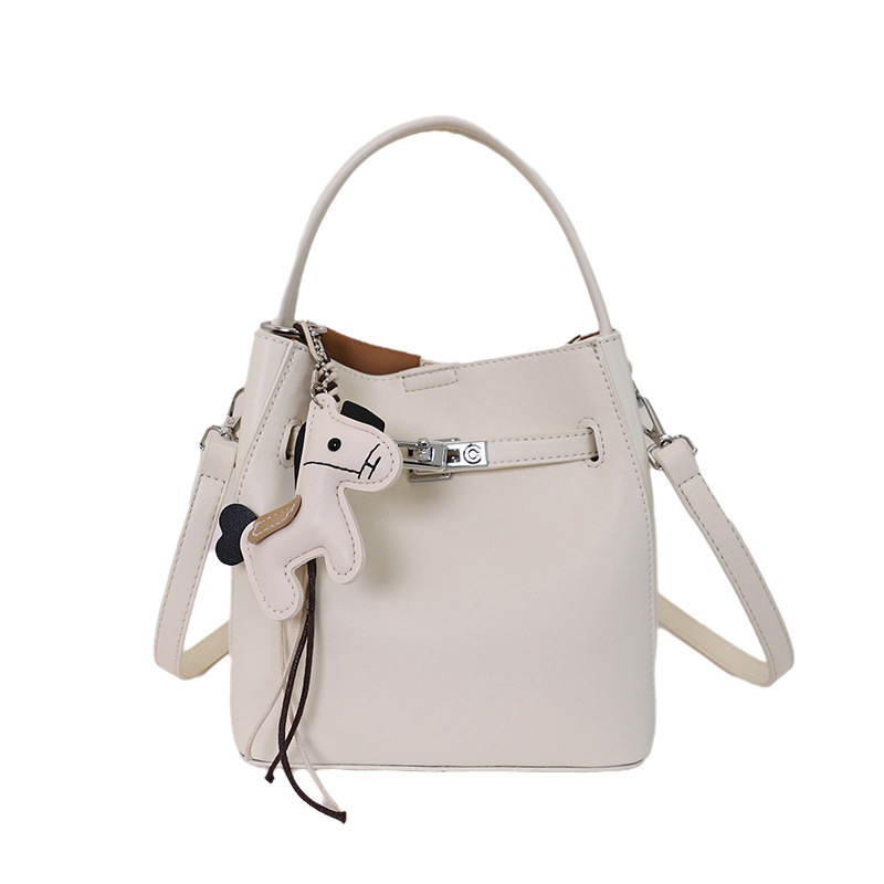 Bolsa de cubo de moda coreana para mujeres 2026 venta caliente nuevo lujo ligero versátil textura alta mochila de hombro