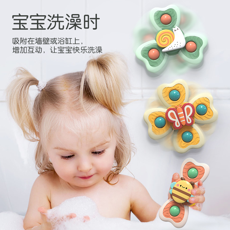 Cross-border new baby insect suction cup spinning fun baby teething gum comfort cartoon finger top toy flower