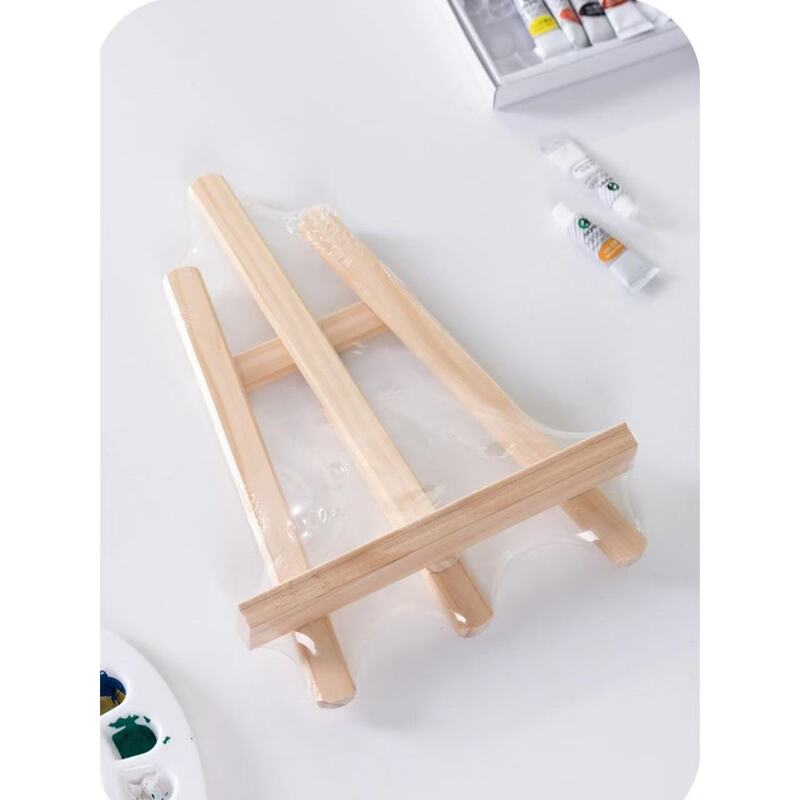 卸売りのミニの小さい画架の木製の初心者のデスクトップの画架の水の粉の展示棚の平板のスタンド式の携帯|undefined