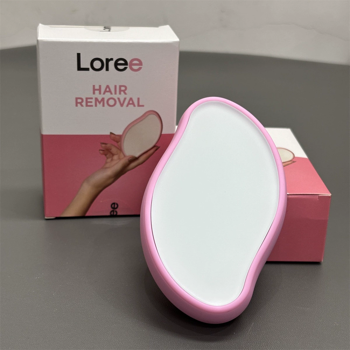 Epilator (Loree) handheld hair removal and exfoliation tool, compact ergonomic design
