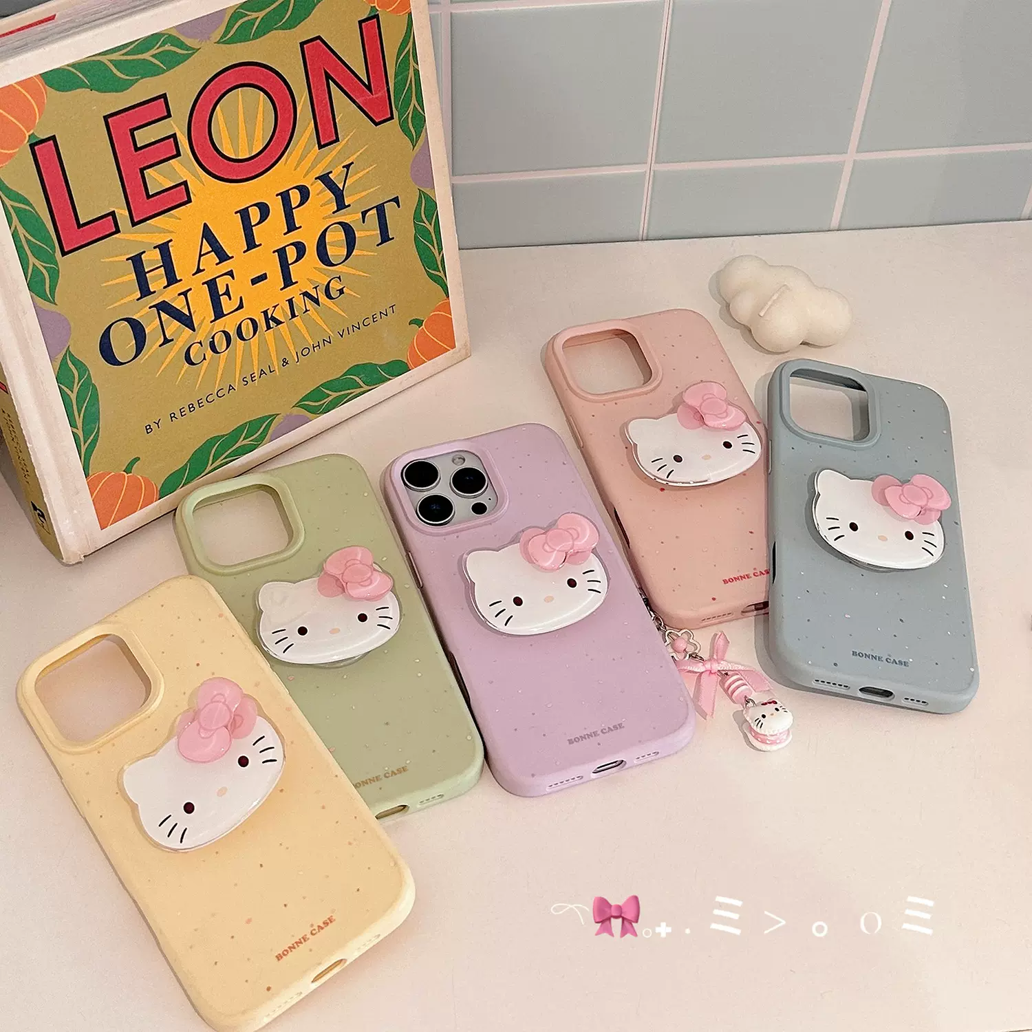 蝴蝶结猫咪旋转支架适用iphone17promax手机壳16卡通13苹果14挂件