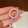 Эластичное кольцо с маргариткой и жемчужиной