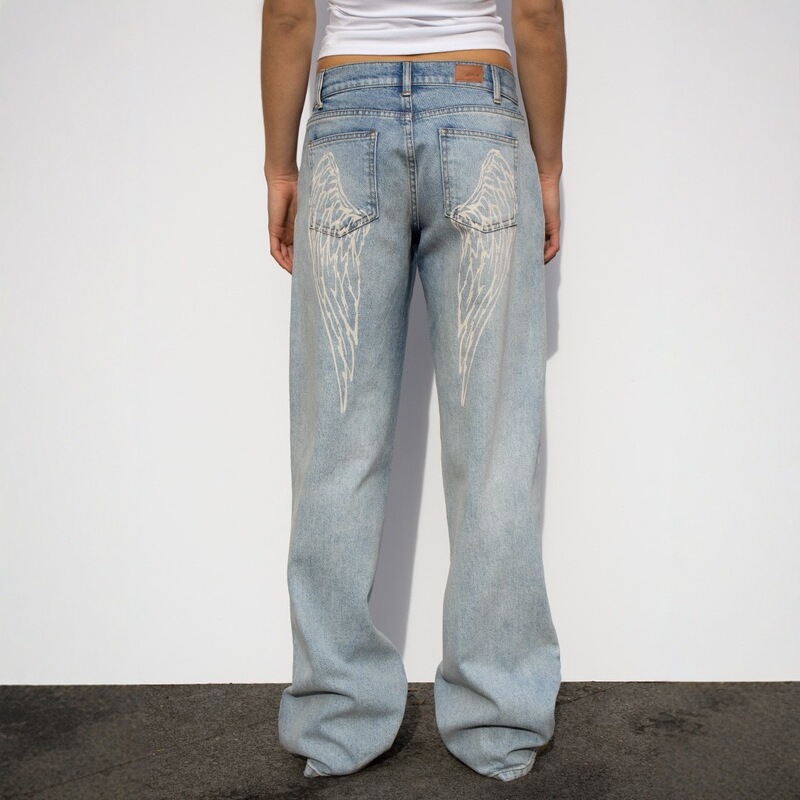 In stock: subdued European and American angel wing print jeans for women, y2k style, washed and distressed, loose straight-leg, floor-length pants In stock: subdued European and American angel wing print jeans for women, y2k style, washed and distressed, loose straight-leg, floor-length pants