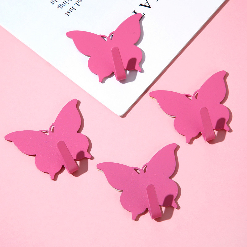 Gancho de mariposa fuerte sin agujeros ins viento encantador gancho adhesivo de corazón de niña decoración de pared de habitación gancho adhesivo de alto valor visual