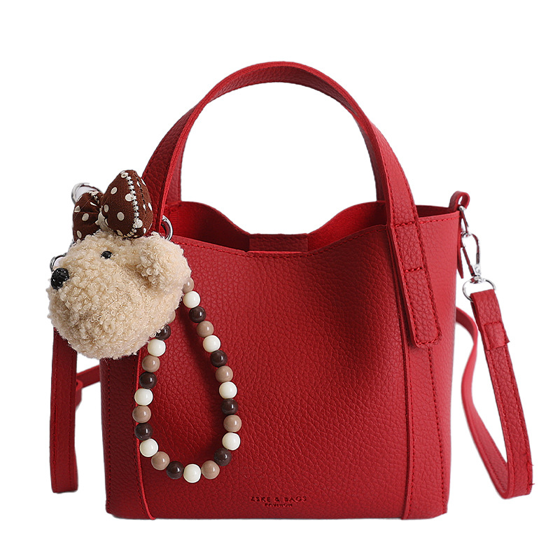 Nicho coreano litchi pattern bolso de cubo de mano mujer comercio exterior nueva moda alta textura ligera lujosa bolsa de mochila