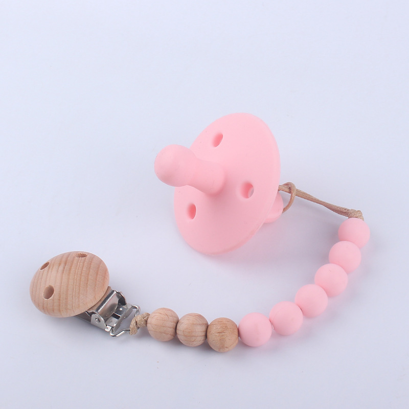 Nuevos suministros para bebés chupete bebé pezón de silicona creativo bebé mordida Cadena de pezón de silicona conjunto de dos piezas