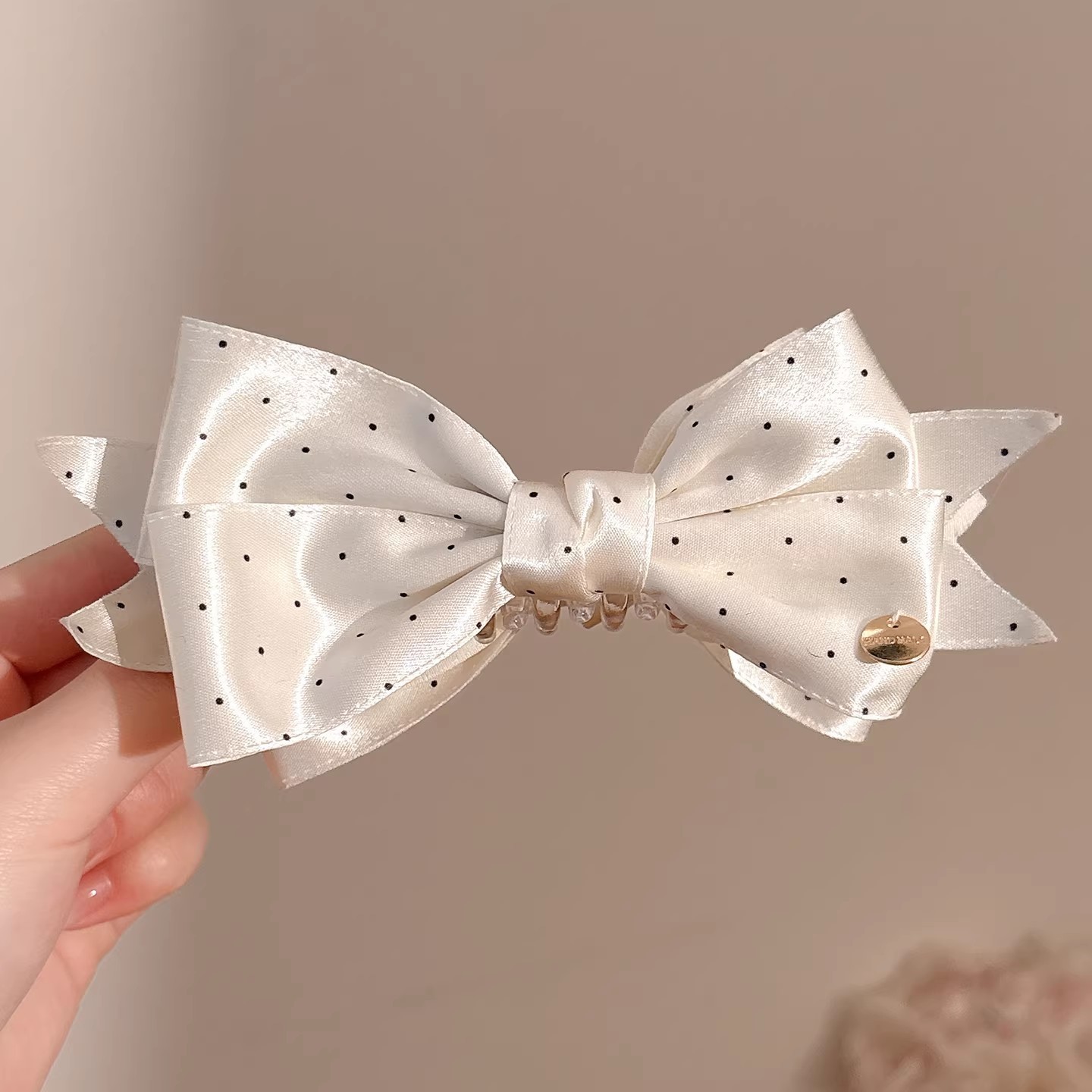 2# beige polka dot bow banana clip - bottom clip approximately 10cm