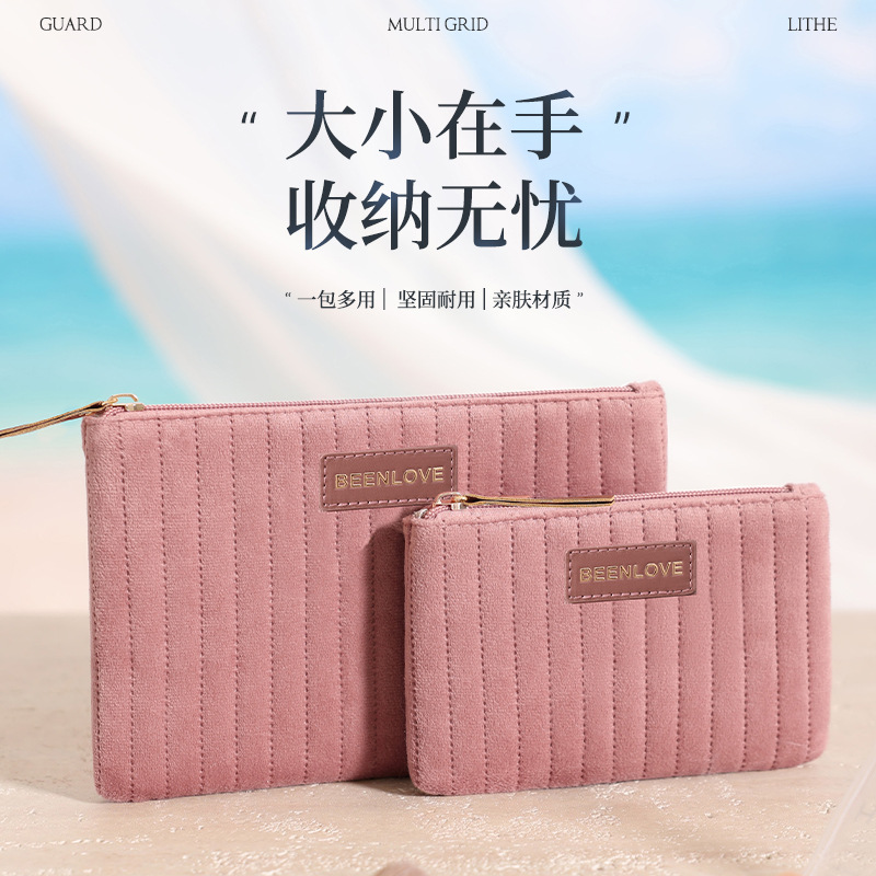 Nuevo paquete de maquillaje de terciopelo holandés transfronterizo de gran capacidad portátil para mujeres de alto valor de cosméticos de cuidado de la piel estriados bolsa de almacenamiento