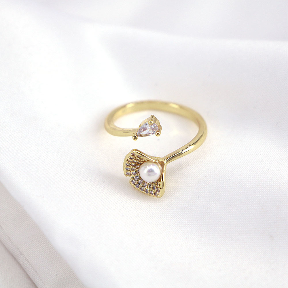 Fashion Micro-encrusted Zircon Pearl Copper Female Simple Opening Creative Ring display picture 4