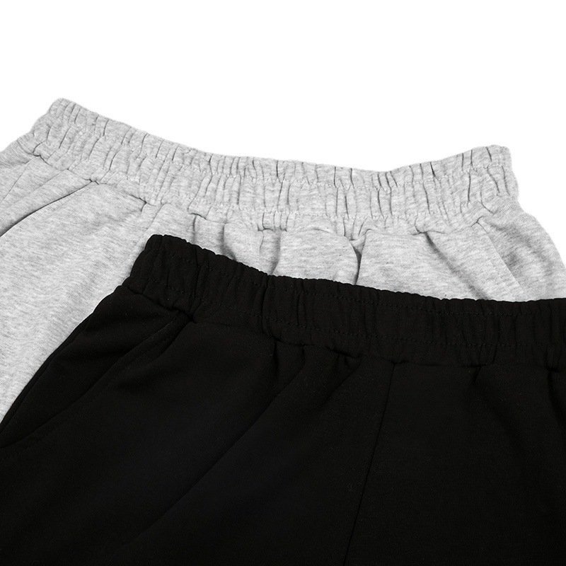 Pantalones cortos deportivos de verano los chicos se relajan con pantalones de cinco puntos y pantalones deportivos relajados y transpirables.