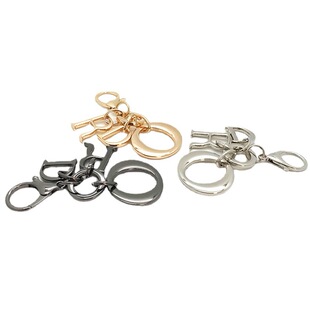 Bag hardware DOR pendant metal buckle zinc alloy die-casting women's bag front decorative letter pendant factory outlet