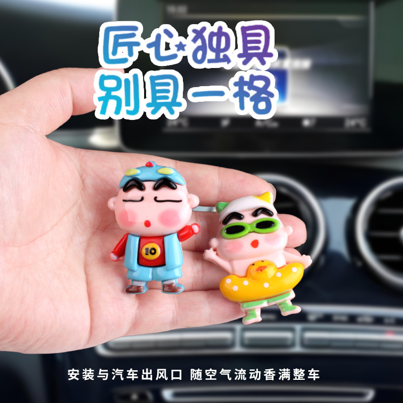Vehículo de ventilación pequeña cabeza grande pequeña nueva fragancia perfumes de automóviles dibujos animados adornos artículos de decoración artículos de automóviles
