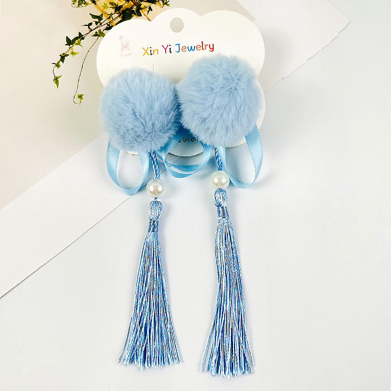 Bola de pelo azul horquilla 1 par