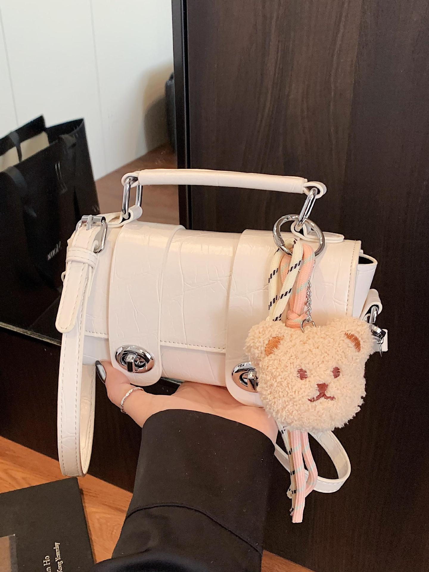 Bolso cuadrado pequeño con bloqueo de nicho coreano único extranjero para mujer 2025 nuevo bolso de hombro de tendencia salvaje bolso de mensajero de moda de estilo occidental